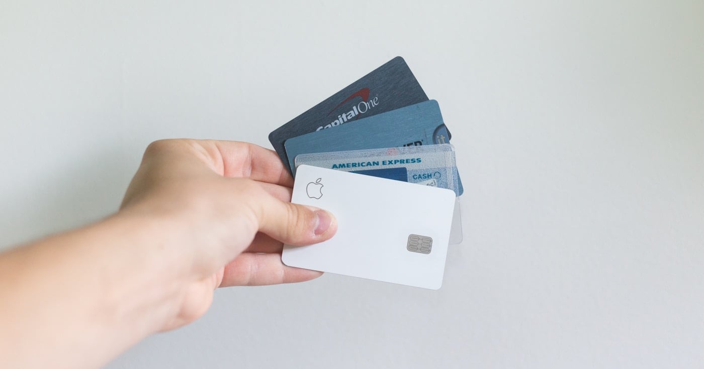 Chargeback statistics: person holding credit cards